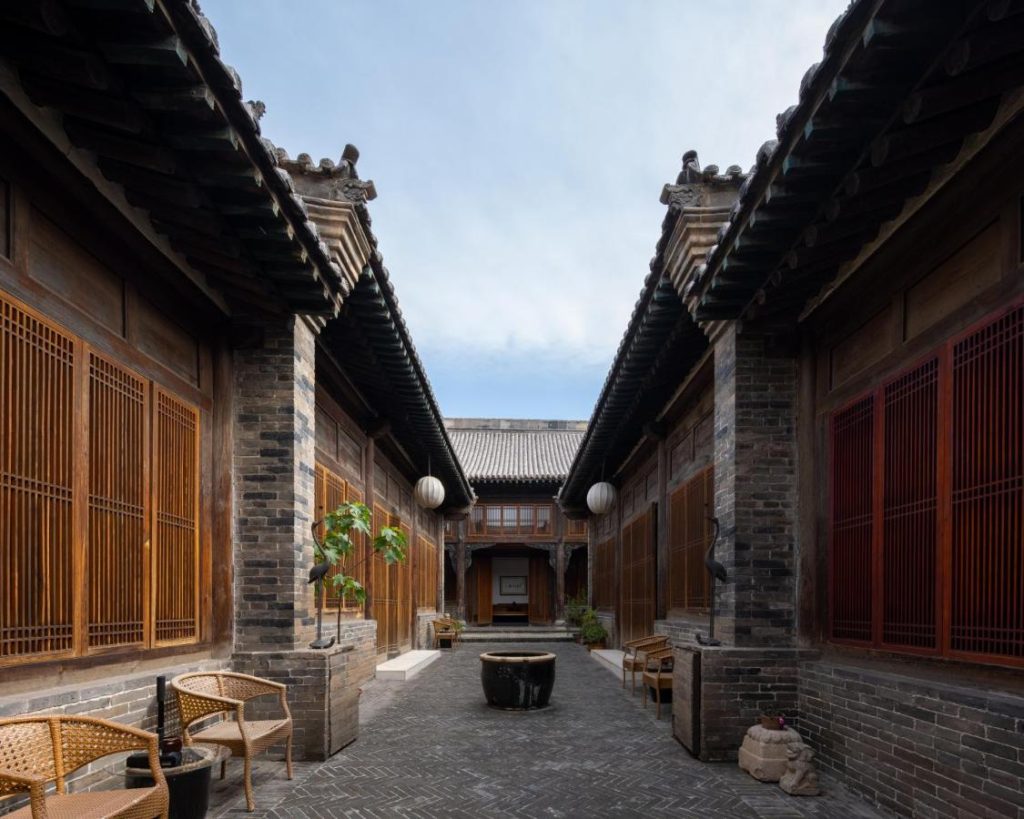 WildChina introduces the Best Boutique Hotels in China (2024) - Grey brick pavilions at Jing’s Residence.