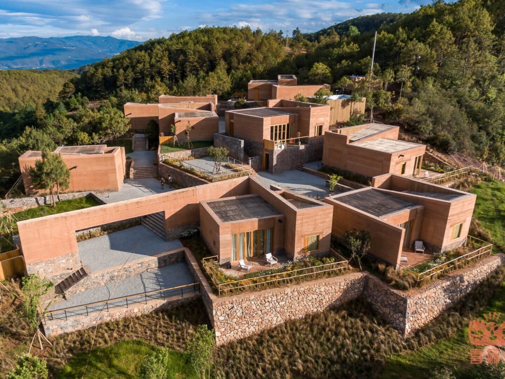 WildChina introduces the Best Boutique Hotels in China (2024) - Eco-friendly “rammed earth” guest rooms at the Linden Center.