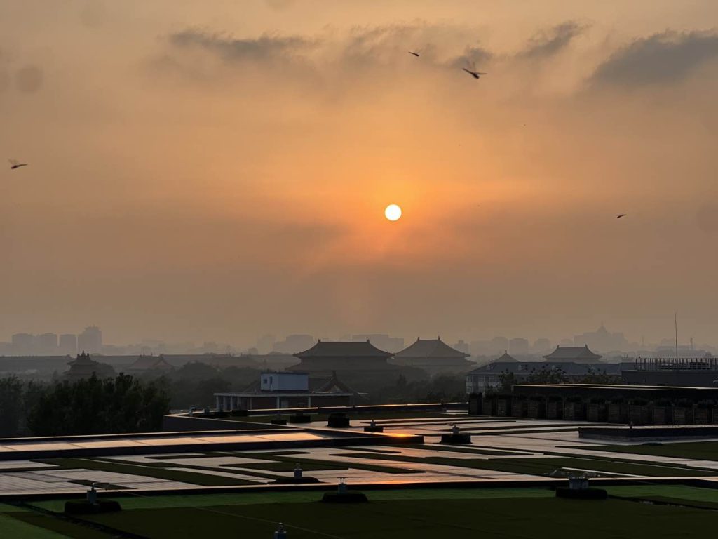 Guests can take in views of the Forbidden City at sunset, photo by Gabrielle Keepfer