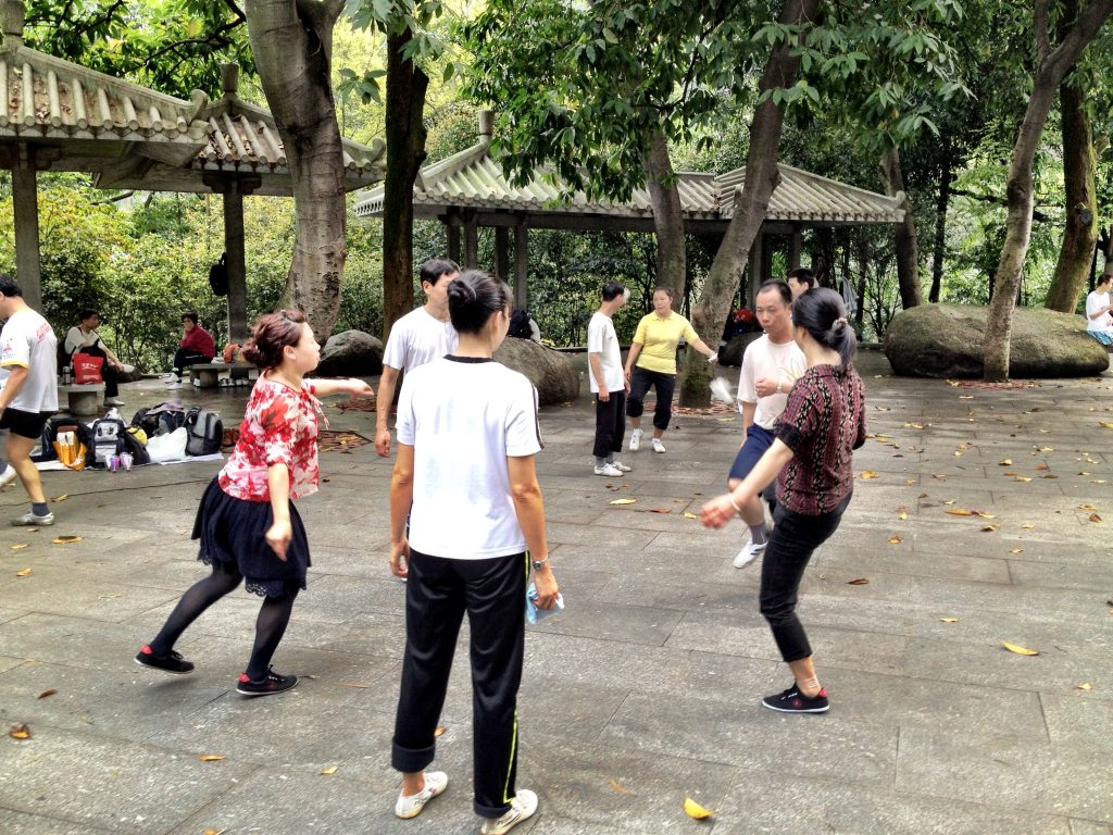 The Heart of the Park: Exploring China’s Communal Games Locals enjoy a game of ti jianzi in Yuexiu Park, Guangzhou China
